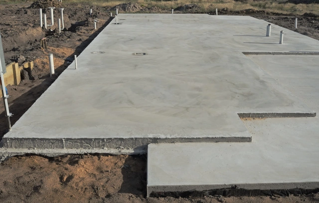 Concrete foundation slab prepared for construction